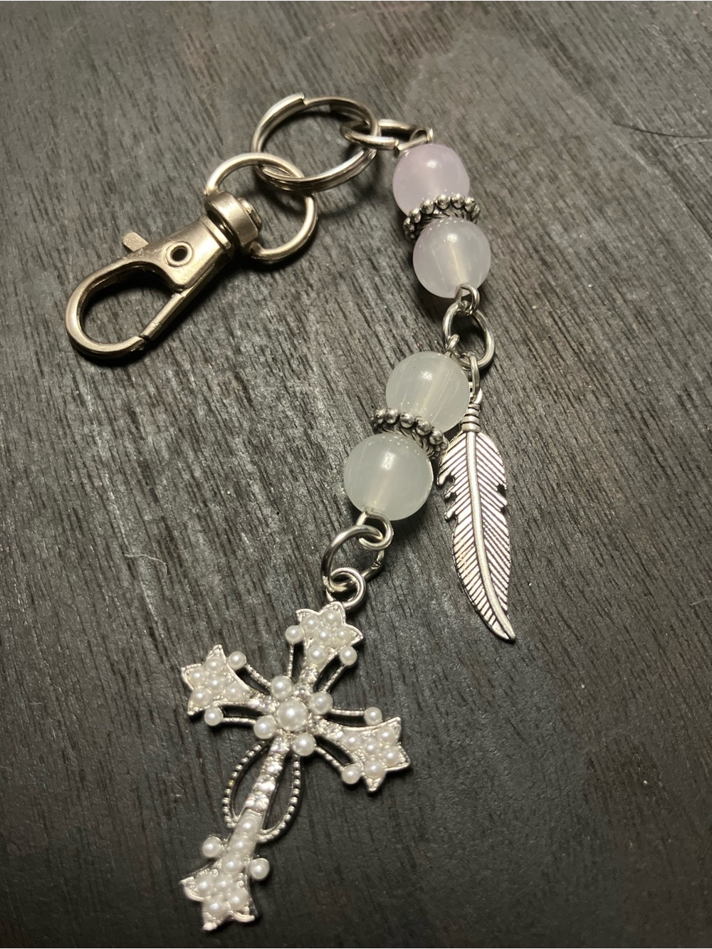 Silver,white glass beads/silver cross/feather charm/keychain